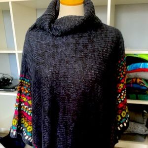 Women’s poncho style sweater